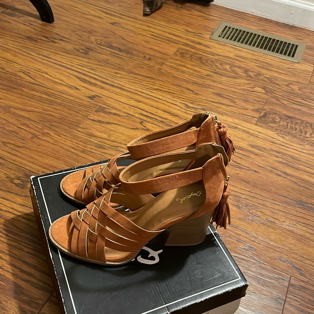 Woman’s sandal wedge heels